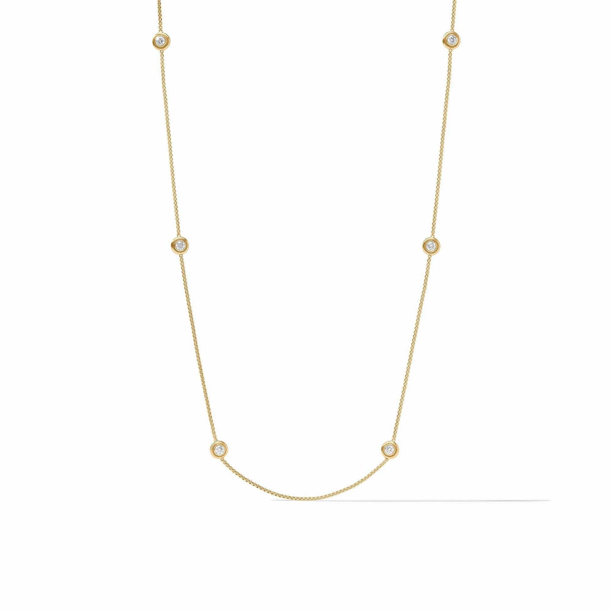 Gold plated Tribeca Station necklace with cubic zirconia stones on a chain.