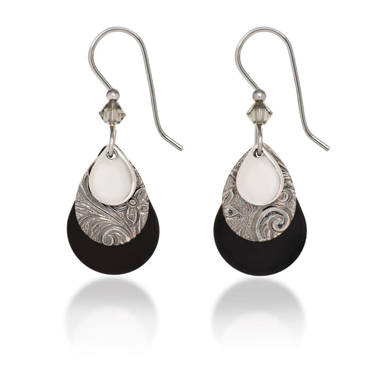 Triple-layered teardrop earrings with silver acetate, matte black accents, and a sparkling crystal bead on surgical steel wires.
