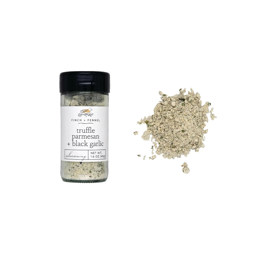 Front view of Truffle Parmesan + Black Garlic Seasoning jar with black label and white text.
