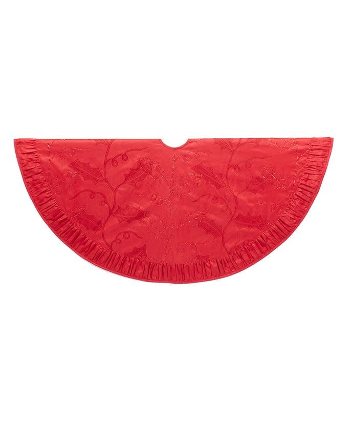 Round red sequined tree skirt with holly leaf accents