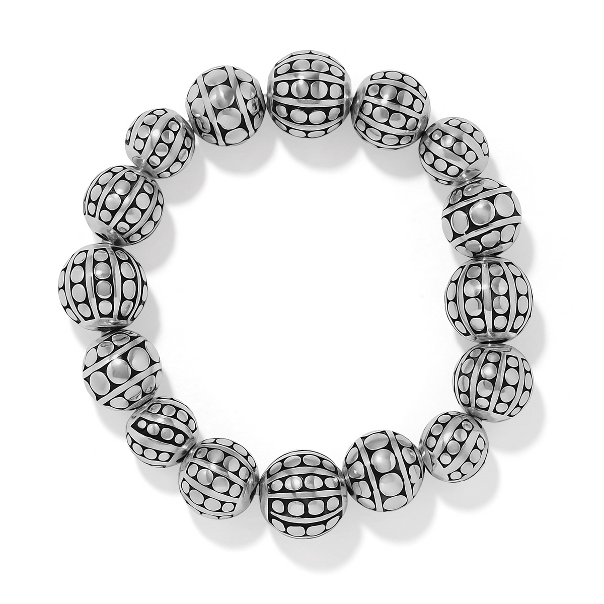 Pebble Dot Bola stretch bracelet featuring round silver beads with a textured dot pattern.
