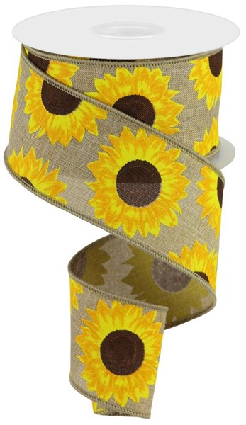 A roll of royal blue ribbon featuring a sunflower print on beige polyester fabric.