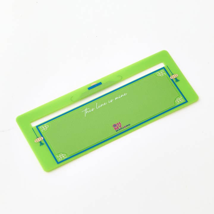 Mahjong Line Finder tool with a white body featuring colorful line indicators on the top surface.