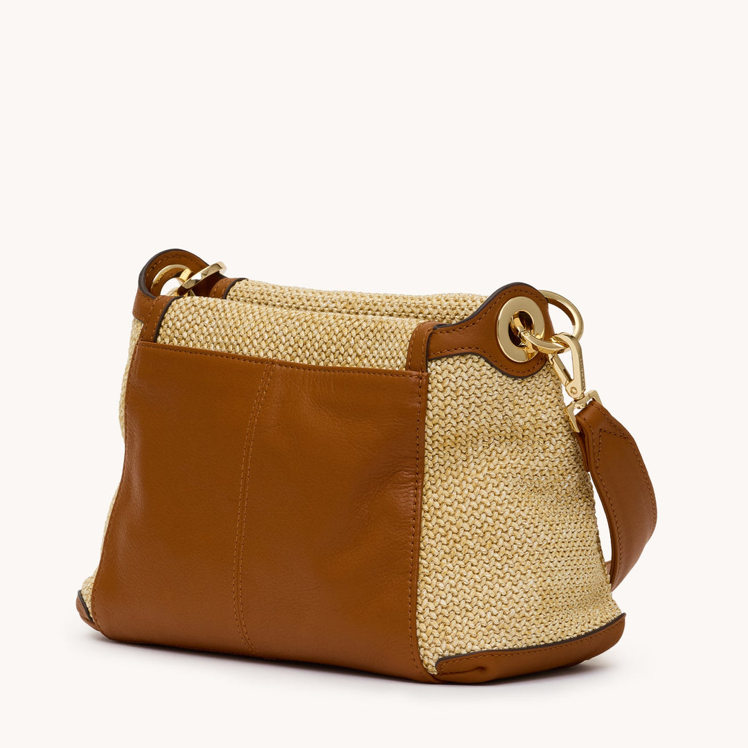 Bryant Med Cocoa Raffia handbag with brown leather panels and gold hardware.