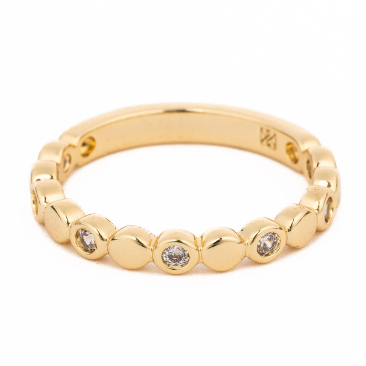 18K gold plated ring with alternating polished gold discs and bezel-set clear crystals.