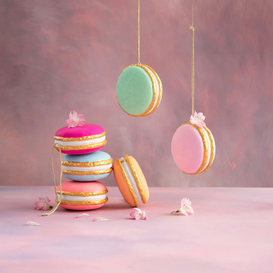 Small macaroon display stand featuring a hand-painted fiber pulp finish with gold leaf accents.