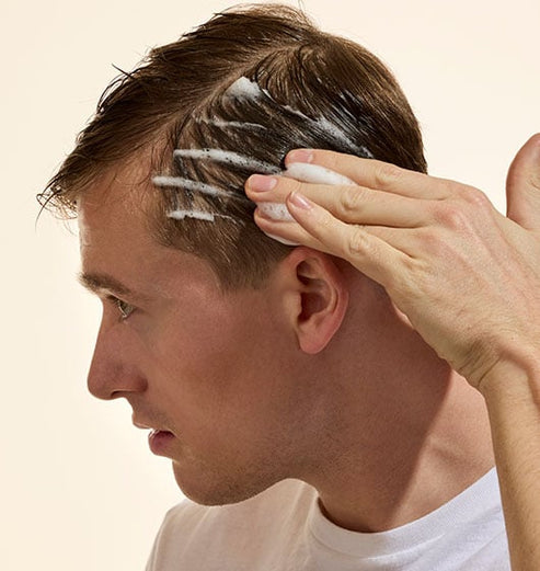 True Volume Hair Density Foam in a clear bottle with white cap