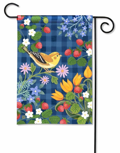 Garden flag with a yellow bird on a branch with strawberries, tulips, and blue flowers on a blue plaid background.