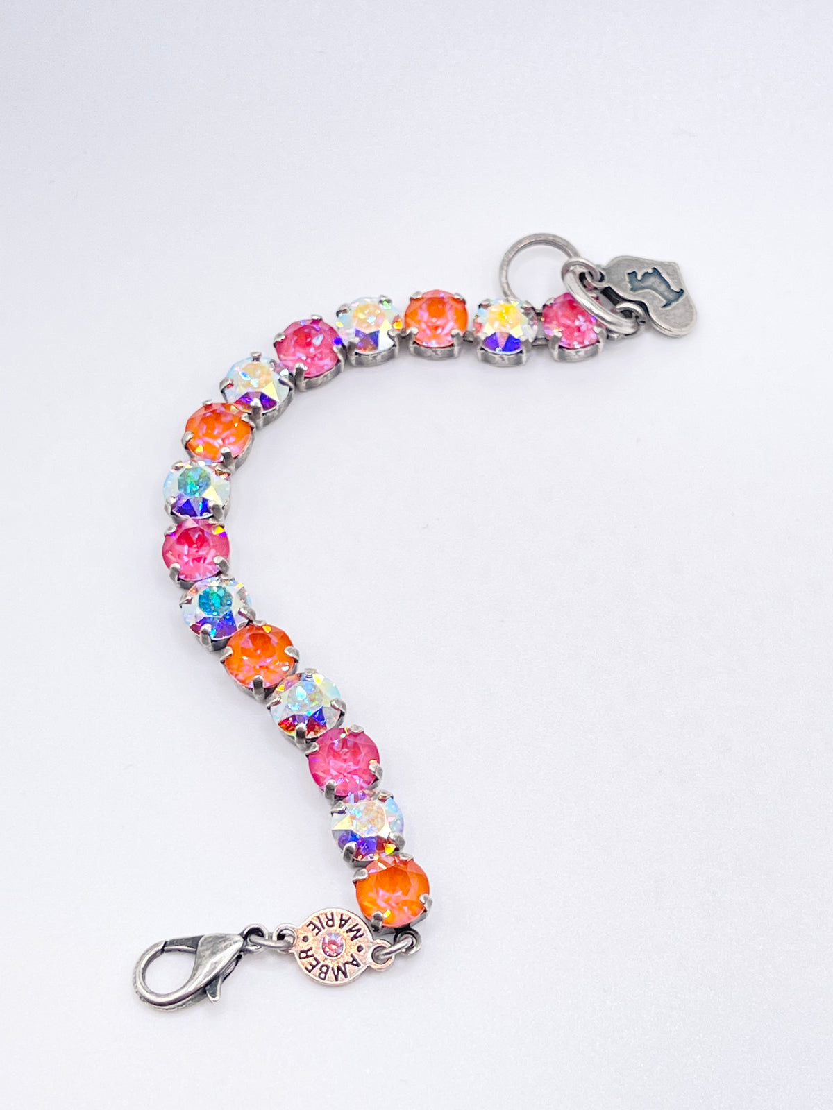 Adjustable silver-tone bracelet featuring a Scotty dog heart charm with Tampa-inspired whimsical detailing.