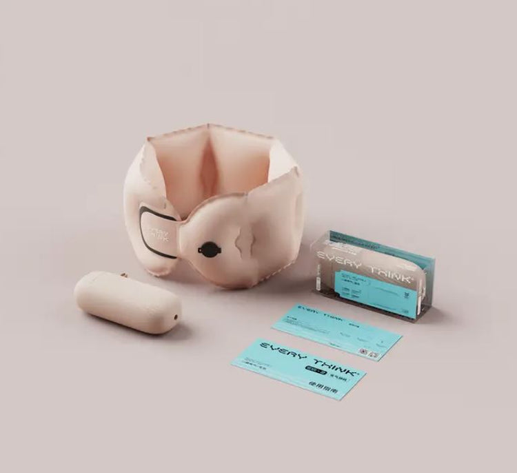 Pink self-inflating neck pillow with storage case