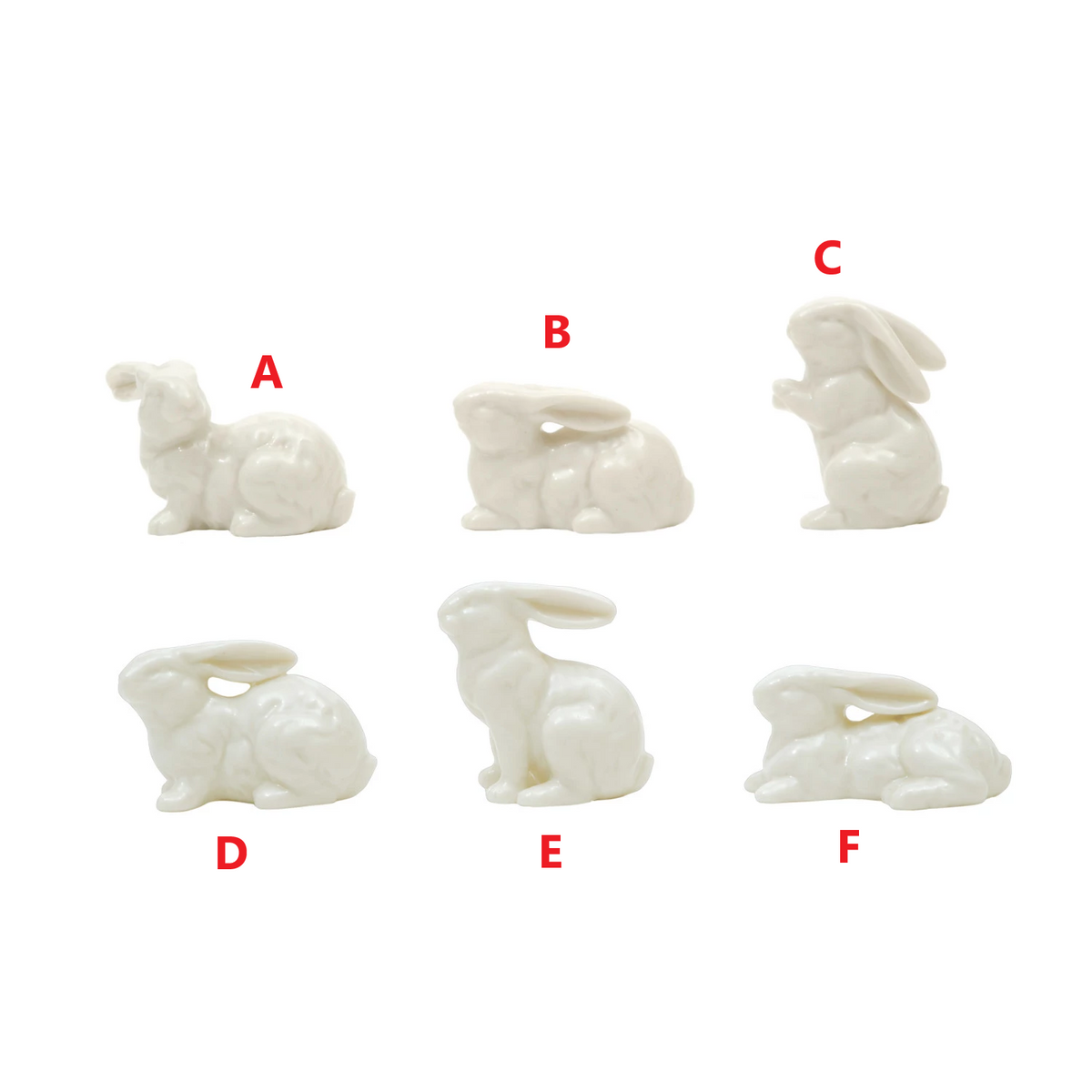 Tiny ceramic bunny figurine in white with a smooth rounded silhouette.