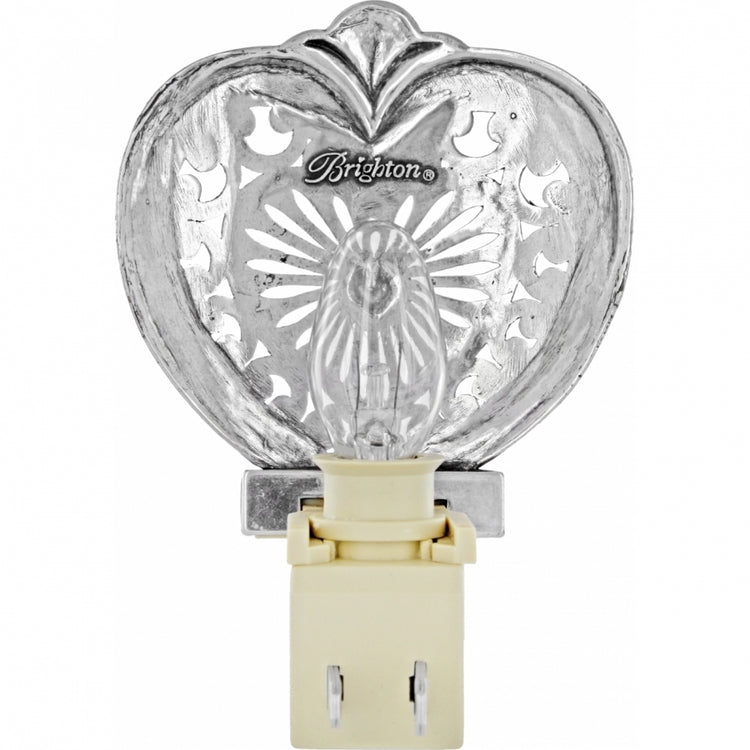Silver-plated heart-shaped nightlight with intricate cutouts and a clear bulb.