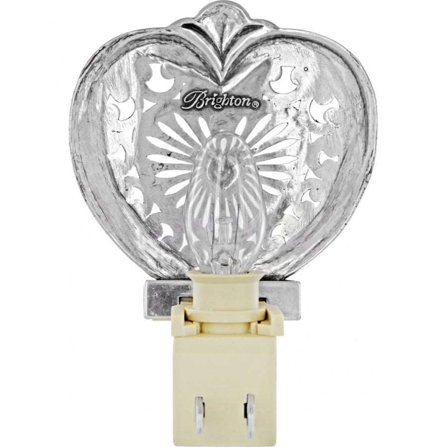 Silver-plated heart-shaped nightlight with intricate cutouts and a clear bulb.