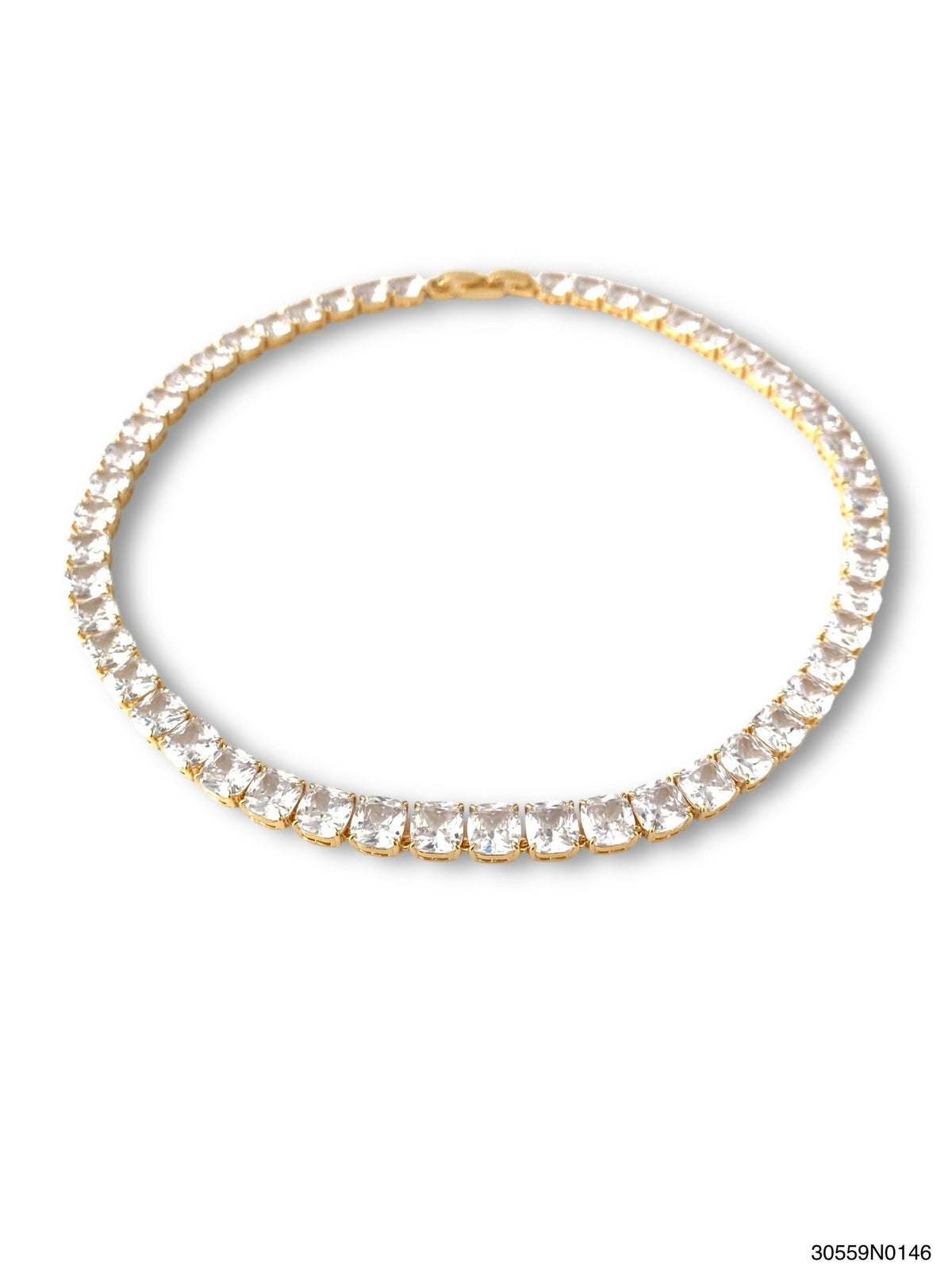Clair Tennis Necklace featuring square-cut cubic zirconia stones in a gold-tone setting.