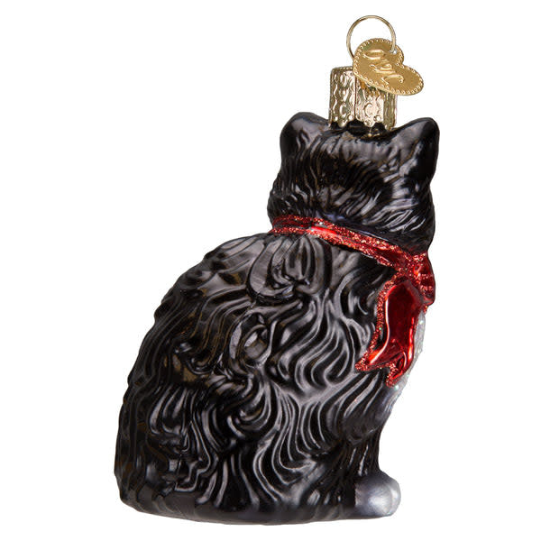 Glass tuxedo cat ornament with black bow tie standing on hind legs