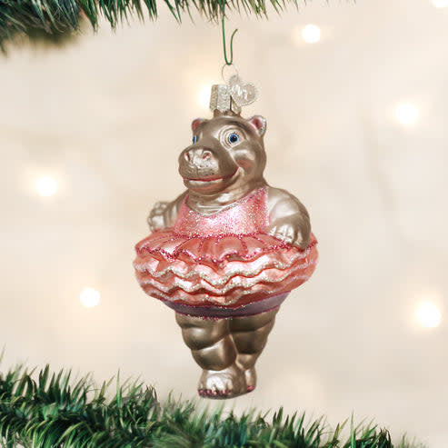 Hand-painted glass ornament shaped like a whimsical foot with silver interior and colorful lacquer glitters.