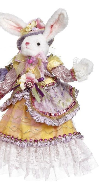 Mr and Mrs Cottontail rabbit figurine with white cotton-tail ears in a seated pose.