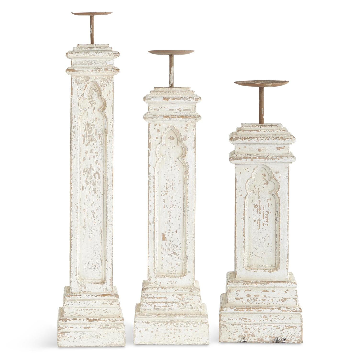 Whitewashed iron candleholders with square resin bases