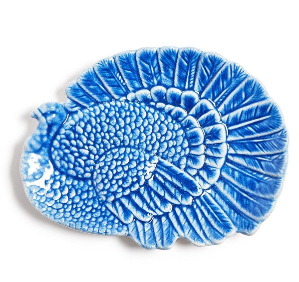 Blue reactive glaze turkey-shaped stoneware platter with sculpted feather details.
