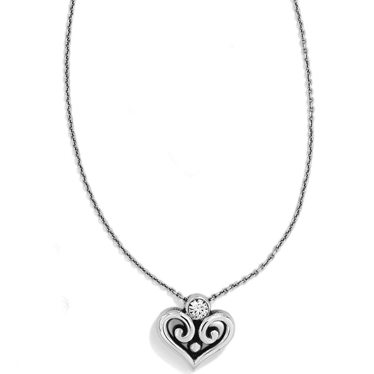 Silver plated Alcazar Heart Necklace with a crystal-accented scrollwork heart pendant.