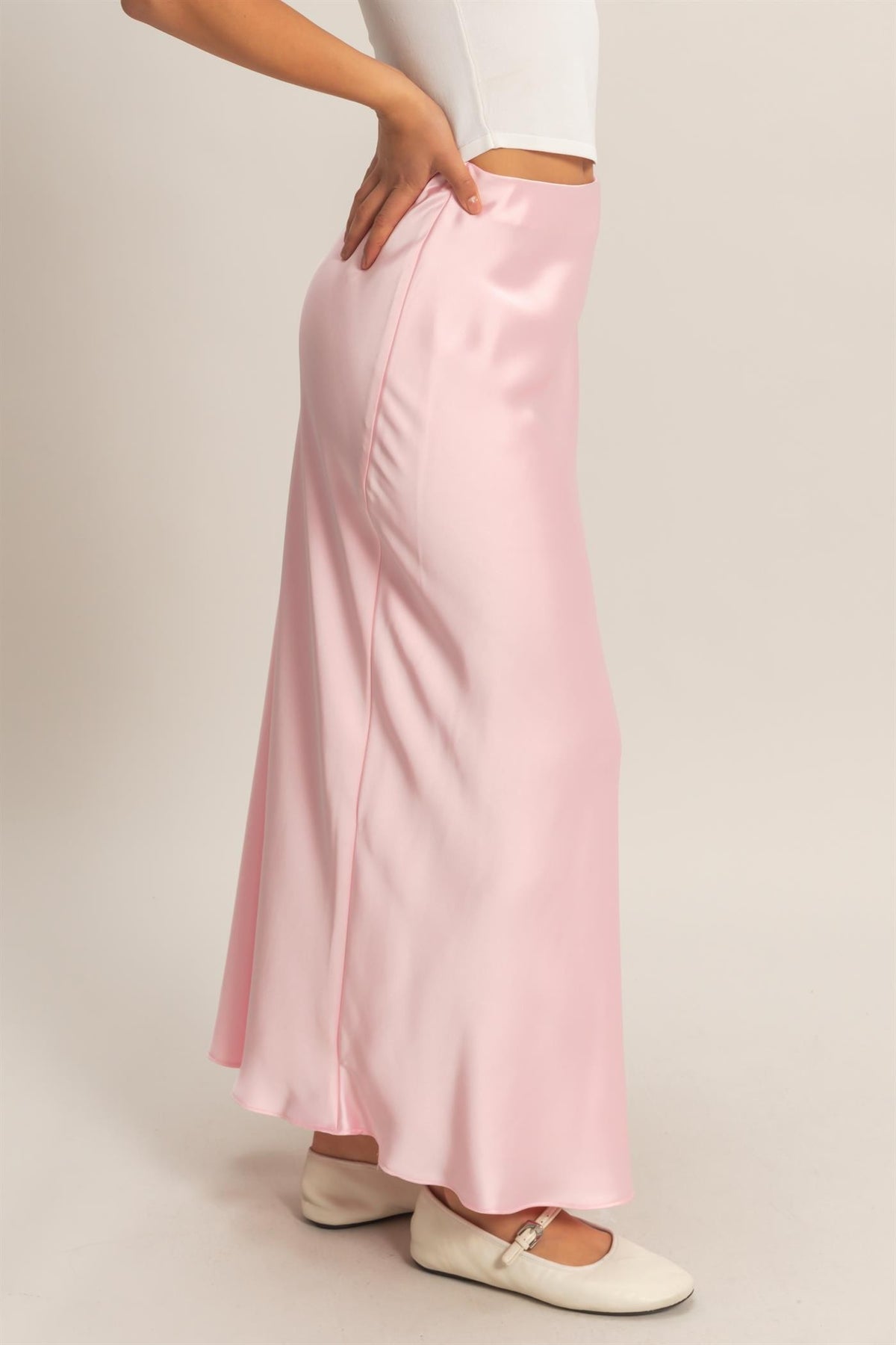 Angel Satin Maxi Skirt in black bias-draped polyester with a flowing silhouette.