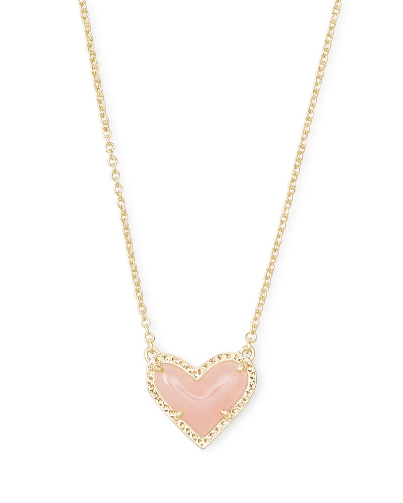 Ari Heart Short Pendant Necklace featuring an asymmetrical heart-shaped pendant on a silver-toned chain.