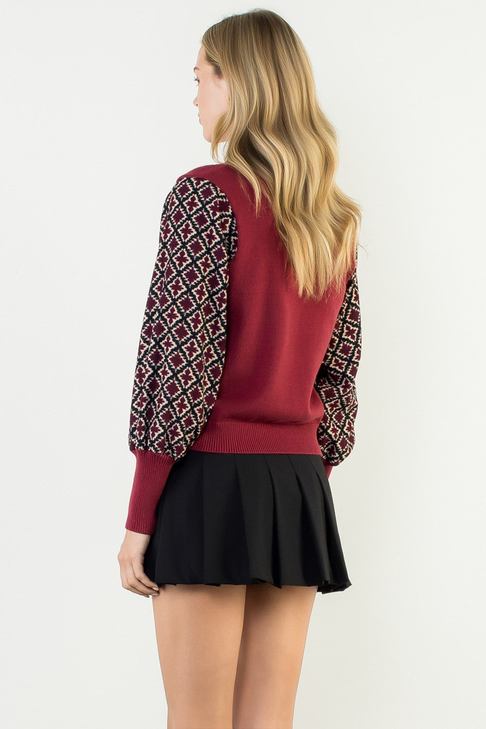 Hannah Mixed Media Knit Top in black with a relaxed fit.