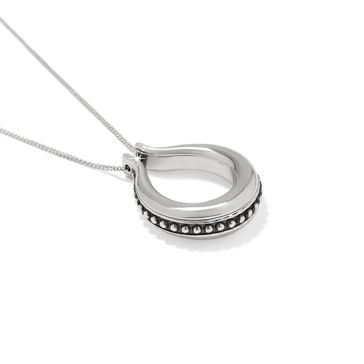 Silver plated Pretty Tough Arch Necklace with a beaded edge pendant on a fine chain.