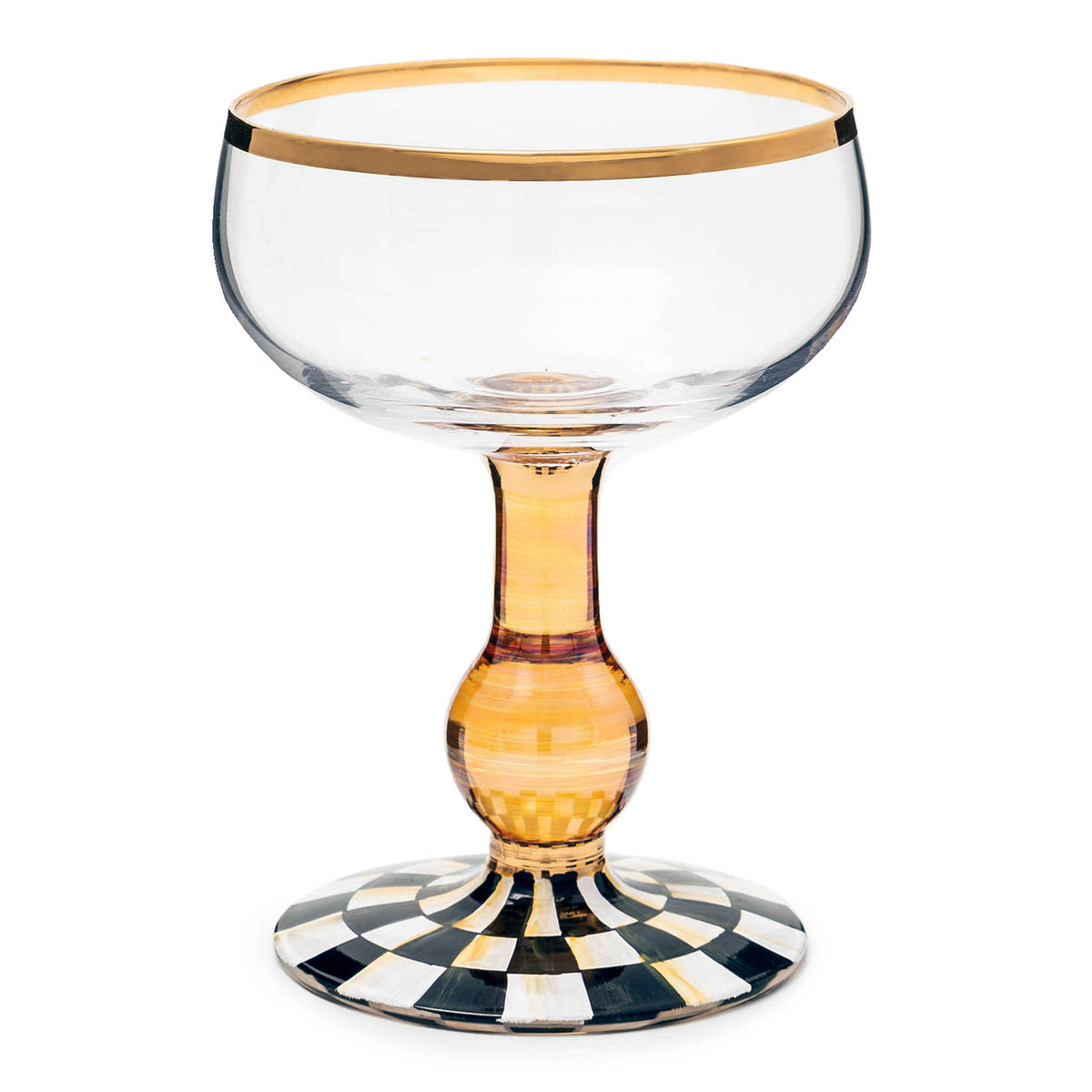 Courtly Check Coupe Glass with a gold rim, amber stem, and black and white checkered base.