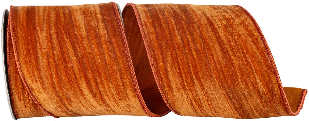 4 inch copper crushed velvet wired edge ribbon with a textured, shimmering finish.