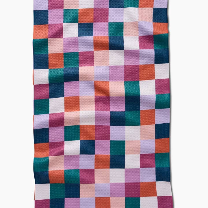 Everyday Tea Towel with a colorful fall checkerboard pattern in waffle weave fabric.