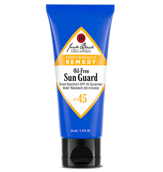 Bottle of Oil-Free Sun Guard SPF 45 sunscreen with white cap against a neutral background.