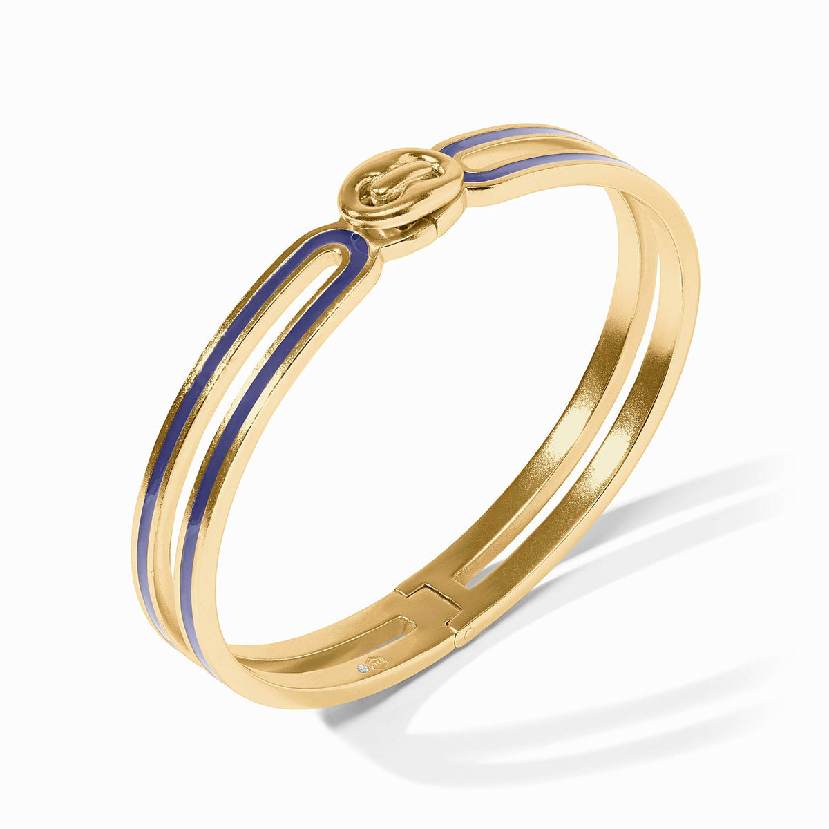Laguna enamel hinge bangle in black with a gold-tone button closure.