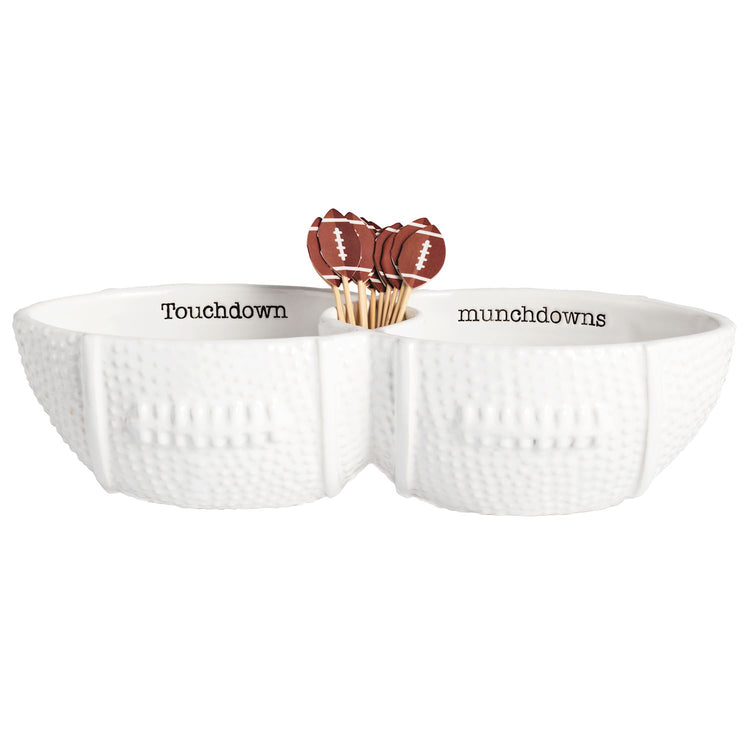 White dolomite football-shaped double server dish with toothpicks featuring football toppers.