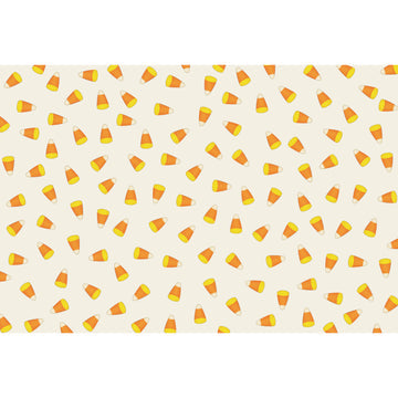Candy corn themed rectangular placemat with orange, yellow, and white striped pattern.
