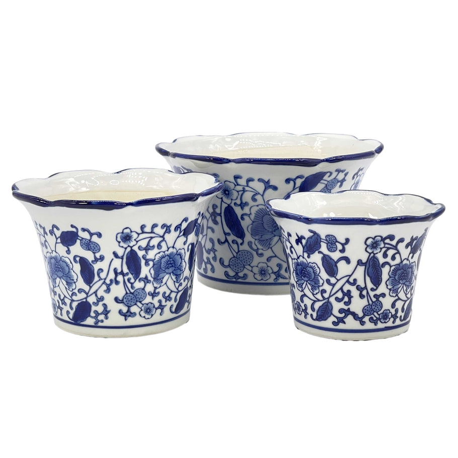 Blue and white floral ceramic pot with ruffled lip style