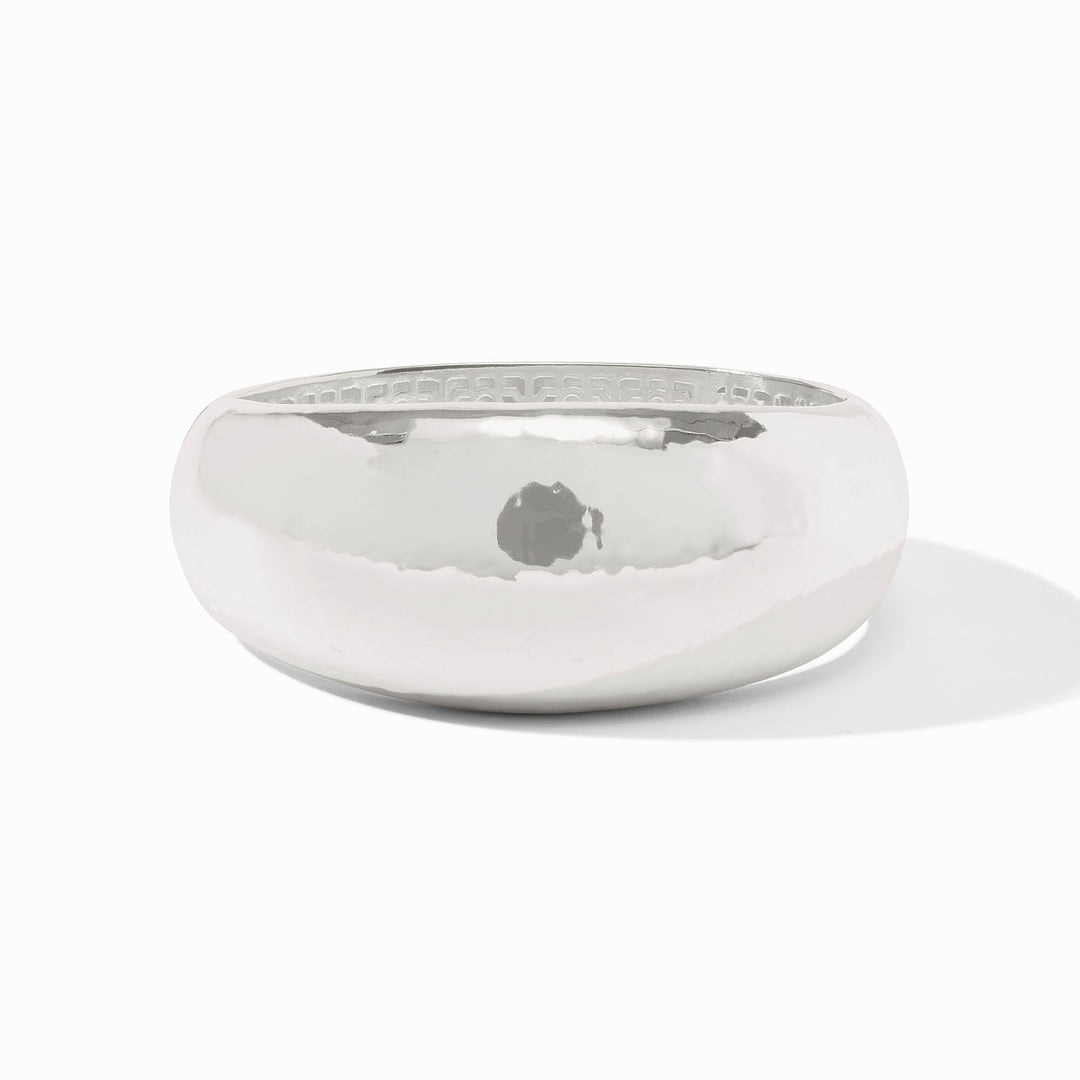 Silver plate statement bangle with a spring hinge closure