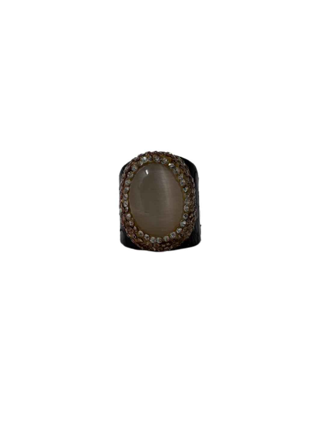 Queen of Sheba Fashion Ring featuring a large oval cat's eye stone surrounded by crystals.