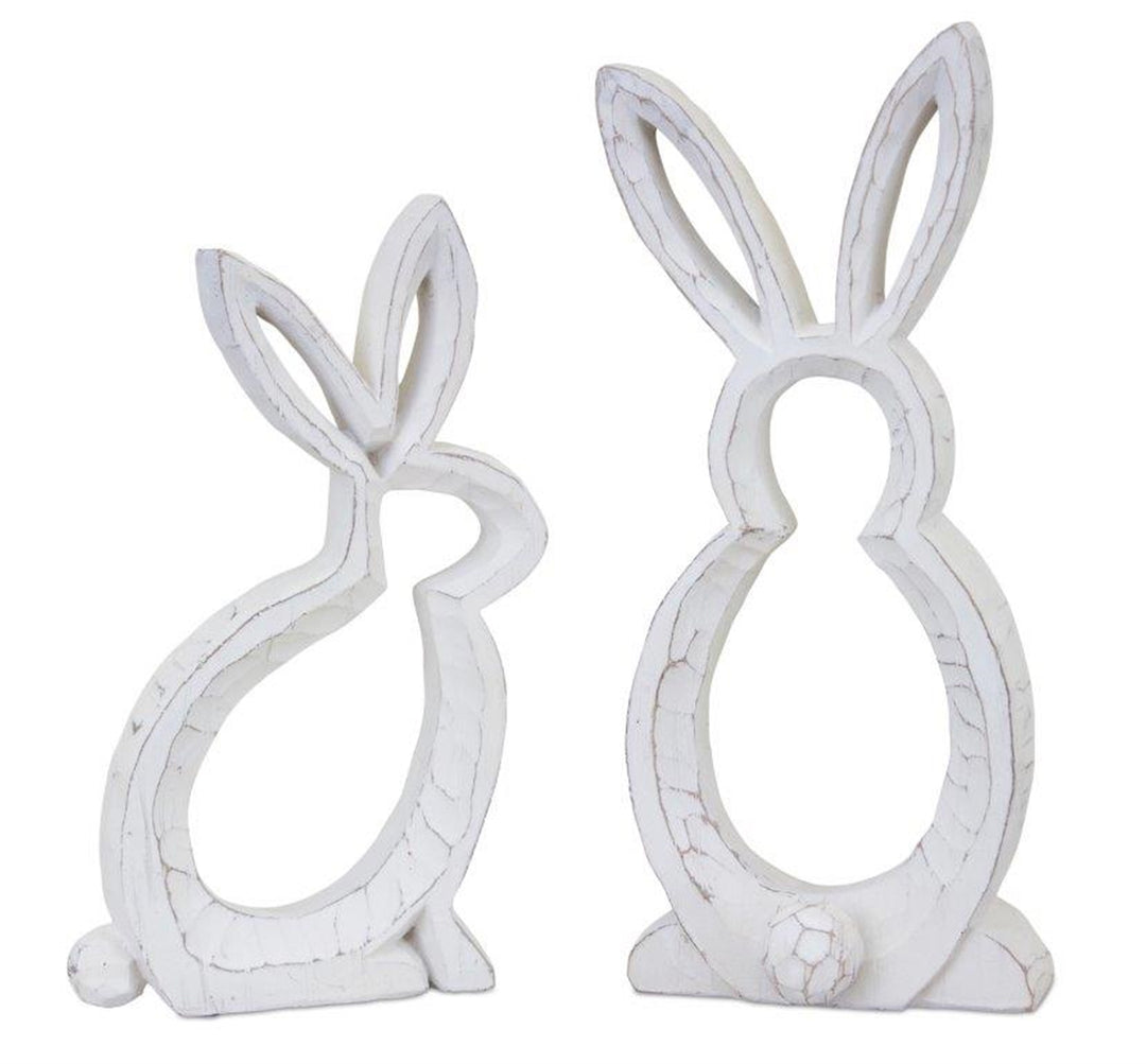White bunny outline resin figurine with a simple silhouette ideal for seasonal centerpieces.