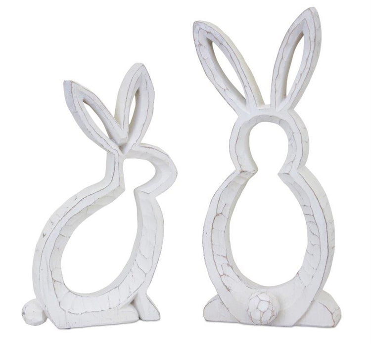 White bunny outline resin figurine with a simple silhouette ideal for seasonal centerpieces.