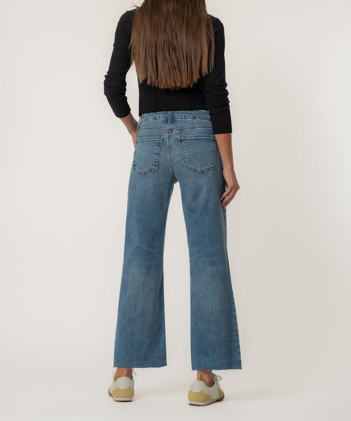 Meg high-rise wide-leg trousers in raw hem with a straight silhouette.