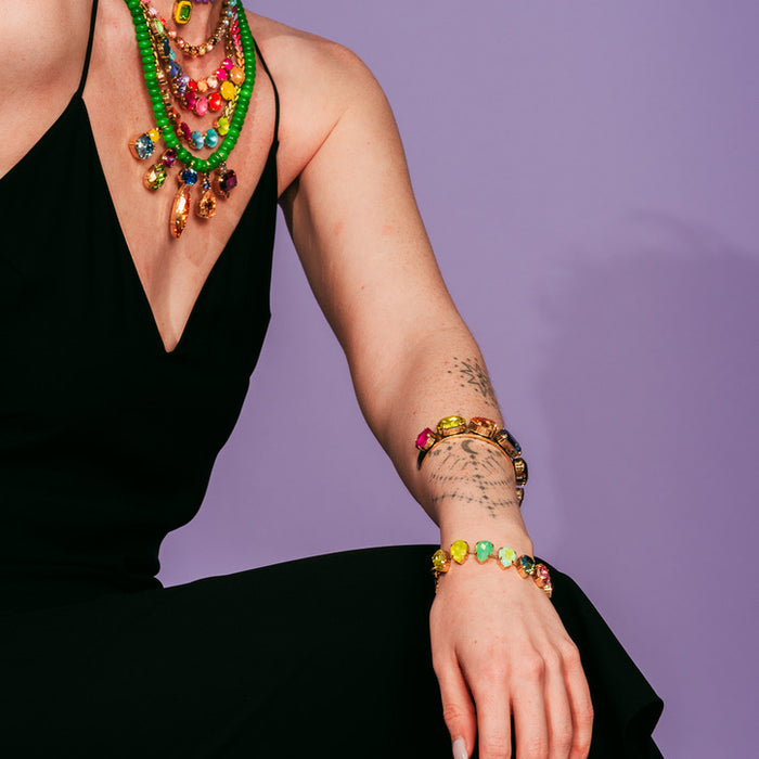 Antique gold plated brass Avani bracelet with sparkling crystals in Candy Crush colorway.