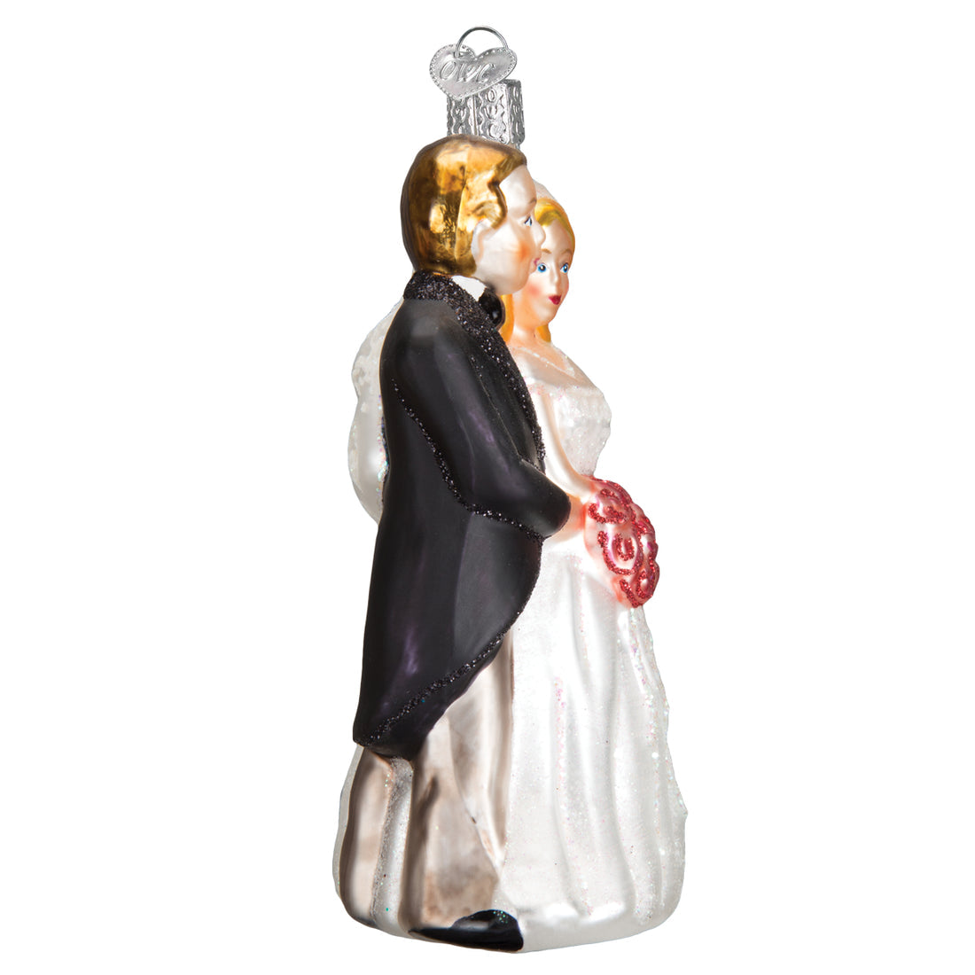 Glass bridal couple ornament featuring a groom in a black tuxedo and a bride in a white gown.