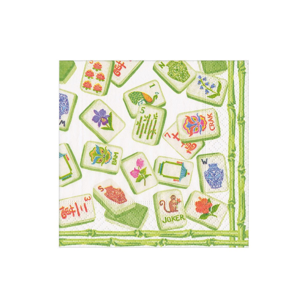 Packaged triple-ply cocktail napkins with printed designs.