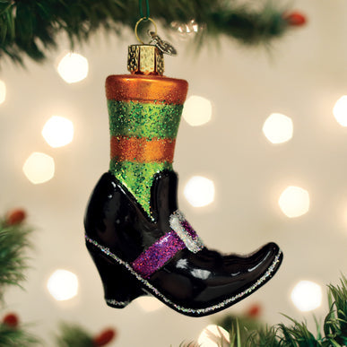 Black witch shoe ornament with pointed hat silhouette
