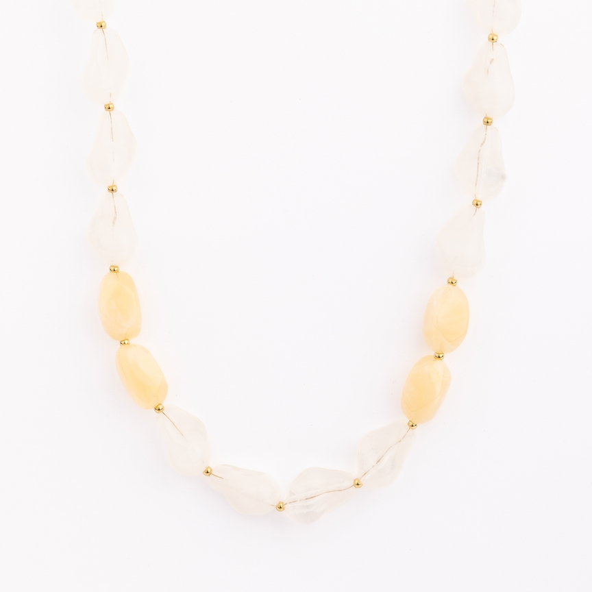 Cami Necklace featuring organic-shaped white and yellow stone beads separated by gold spacers.
