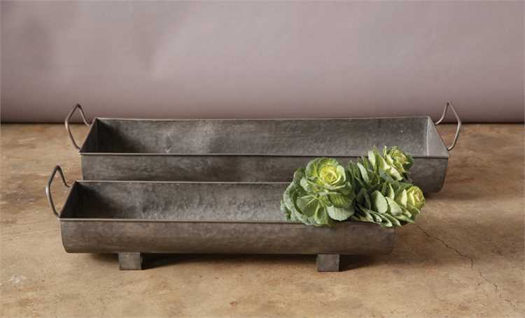 Large metal planter with handles in a natural finish