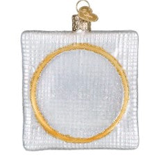 Square white glass Christmas ornament with a gold glitter circle for cross stitch embroidery.