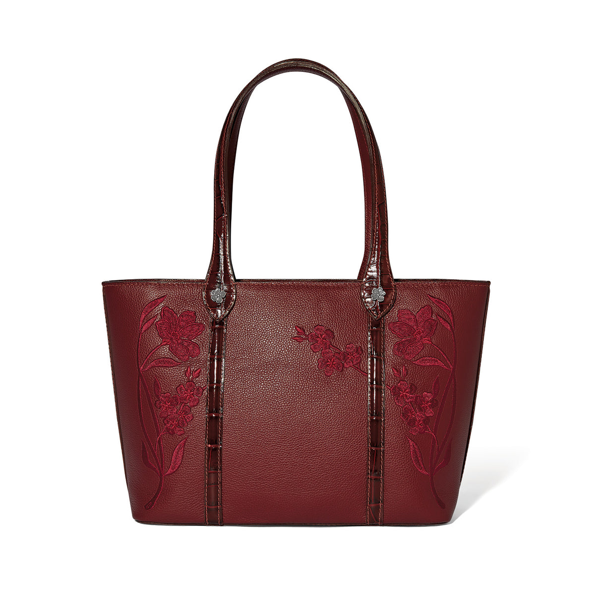 Garnet red leather tote bag with floral embroidery and crocodile-embossed handles.