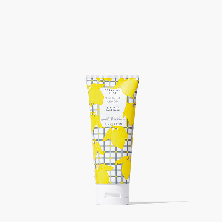 Beekman 1802 Sunshine Lemon goat milk hand cream in a 2oz tube with a yellow lemon pattern.